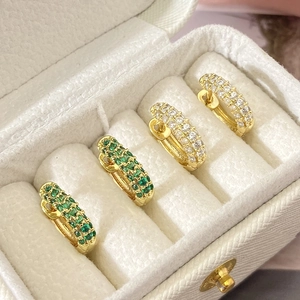 Classic micro-pave zircon hoop earrings in gold with green and clear gemstones