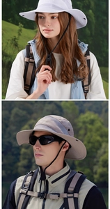 Detail of wide brim sun hat featuring breathable mesh vents and adjustable wind rope