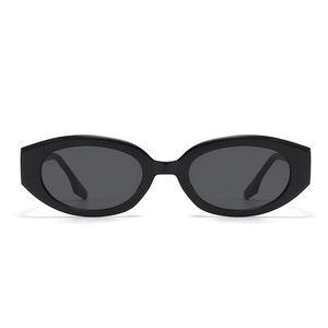 Minimalist cat eye sunglasses with thick black frames and dark grey oval lenses