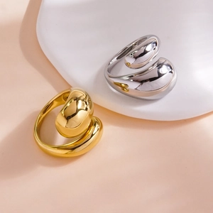 Minimalist teardrop rings in 14K gold and silver finish with polished stainless steel