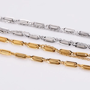 Chic stainless steel handbag pendant necklace in polished gold and silver finishes