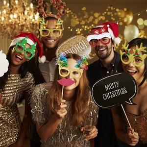 Festive Christmas party glasses and props in red and green for holiday celebrations