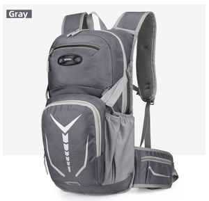 Detail of grey cycling backpack with breathable mesh straps and reflective V-pattern design