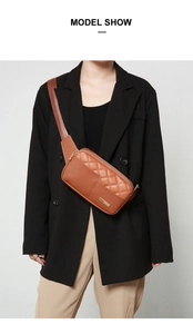 Brown quilted PU leather crossbody chest bag shown on model with gold zipper detail