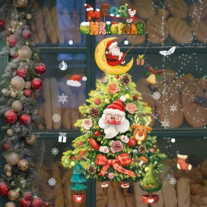 Christmas static window decals with Santa Claus and Reindeer on shop glass window
