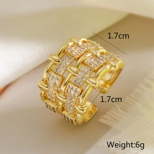 Macro shot showing 1.7cm width and 6g weight of 18K gold plated woven zircon ring