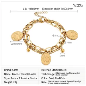 Detail of stainless steel double-layer chain bracelet with sun and moon pendants