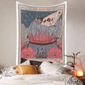Detail of bohemian tarot tapestry The Tower XVII displayed on a bedroom wall decoration