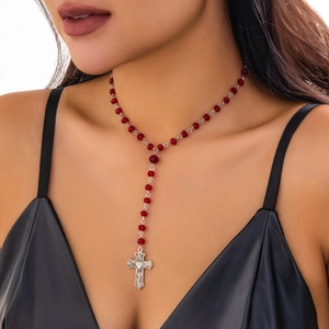 Gothic red crystal rosary choker with silver metallic cross pendant on neck