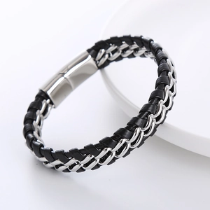 Detail of woven black leather and stainless steel double chain with magnetic clasp