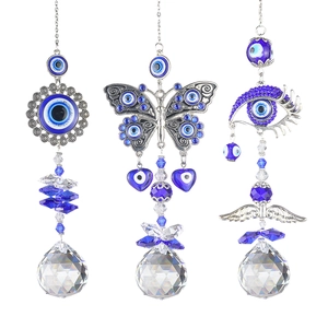 Crystal Evil Eye suncatchers with metal butterfly and flower designs for garden decor
