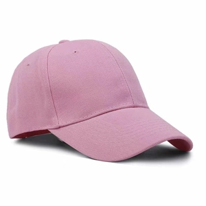 Minimalist pink cotton twill baseball cap with side profile view on white background