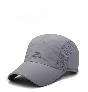 Detail of grey quick-dry sports cap showing laser-cut side vents and SDSRUI logo print