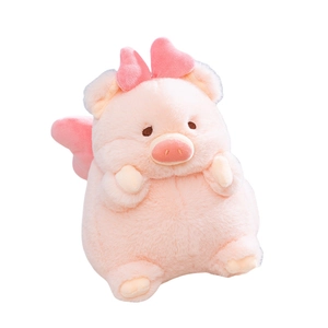 Cute pink plush pig toy with bow and wings in sitting pose on white background