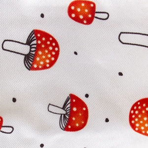 White mushroom pattern bucket hat featuring red polka dot prints on twill fabric