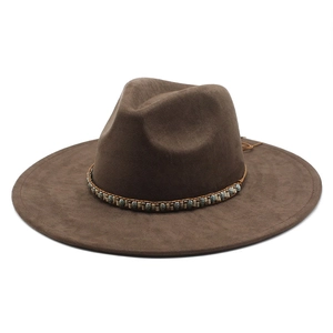 Detail of dark brown faux suede fedora with ethnic beaded band and wide brim