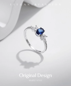 Macro detail of S925 silver ring with blue sapphire stone and S925 engraved stamp