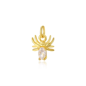 Macro shot of gold-plated spider charm with oval gemstone for DIY jewelry making