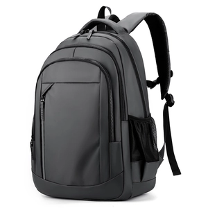 Waterproof black commuter backpack with multiple zipper compartments on white background