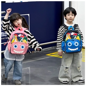Detail view of cartoon monster backpack showing ergonomic shoulder straps and side mesh pockets