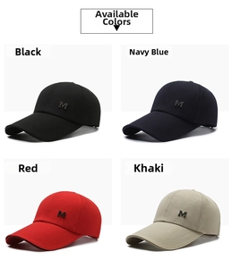 Detailed view of baseball caps in black, navy, red and khaki with metal M logo