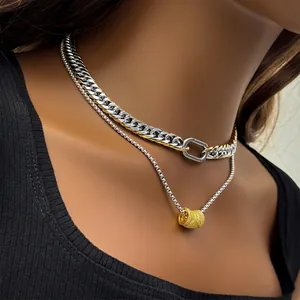 9mm two-tone Cuban link chain necklace with gold pillar pendant and D-clasp closure