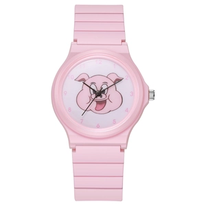 Detail of pink student watch dial featuring a cute cartoon pig and clear numeric scales