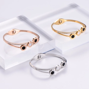 Three-tone roman numeral steel bangle set with shell inlay and cubic zirconia stones