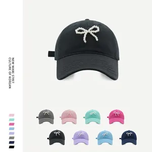 Minimalist cotton baseball cap with pearl bow design in multiple colors for women