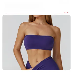 Close-up of deep purple ribbed seamless sports bra featuring a strapless bandeau design
