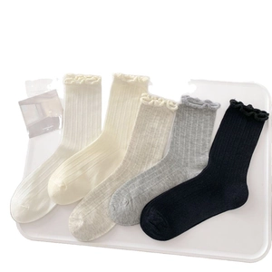 Five pairs of mesh breathable mid-calf socks for women with stylish ruffle trim detail