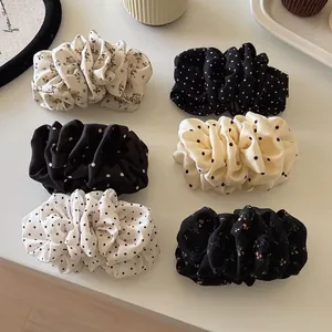 Set of six pleated polka dot and floral hair scrunchies in chiffon and satin fabric