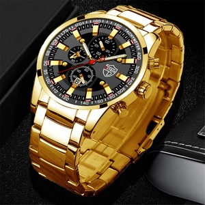 Macro side view of gold stainless steel watch showing bezel detail and luminous dial