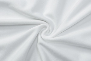 Close-up of white soft elastic cotton fabric with professional spiral pleated texture