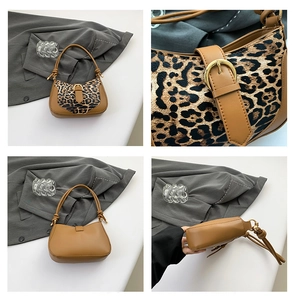 Detail view of leopard print shoulder bag showing hardware, front, back and side profiles