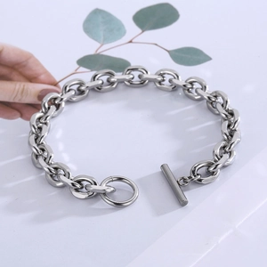 Silver stainless steel OT buckle chain bracelet with hand and eucalyptus leaf decor