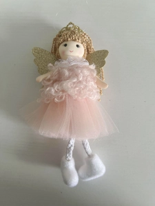 Detail of pink handmade angel ornament with glitter wings and tulle skirt for Christmas tree