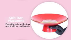 Macro detail of the red coin tray and sensor arm on the electric Daruma money box