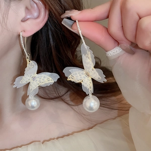 Elegant lace butterfly earrings with rhinestones and pearl drops for a graceful look