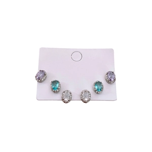 Three pairs of elegant oval cubic zirconia stud earrings in purple, blue and white colors