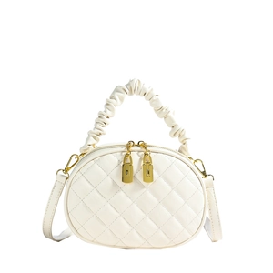White quilted oval handbag with scrunchie handle and gold hardware detail