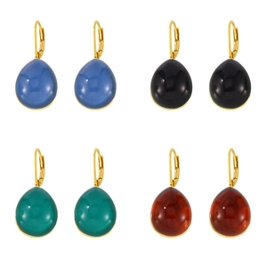Set of teardrop resin earrings in four colors with 18K gold plated hooks on white background