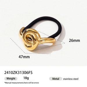 Detailed view of golden stainless steel knot hair tie with dimensions 47mm x 26mm