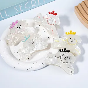 Five-piece poodle dog hair claws in marble finish acetate with crown detail set