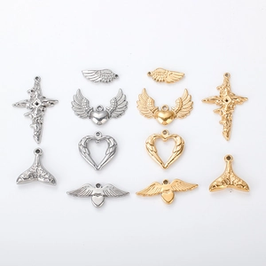 DIY stainless steel gold and silver pendants in cross, wing, and mermaid tail shapes