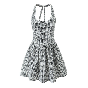 Sweet black and white plaid halter dress with floral embroidery and a bow tie accent
