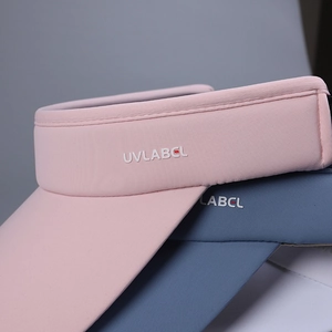 Pink and blue athletic sun visor hats with UVLABCL logo for outdoor summer sports
