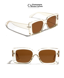 Detail view of champagne square frame sunglasses with tea lenses and model text
