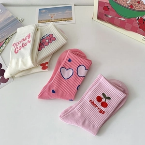 Pink and white knit crew socks set with heart floral and cherry embroidery patterns