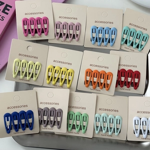 Star-shaped matte colorful metal hair clips for girls set on elegant display cards